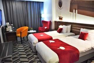 Отель Mercure Bucharest Unirii Бухарест Улучшенный двухместный номер с 2 отдельными кроватями-4